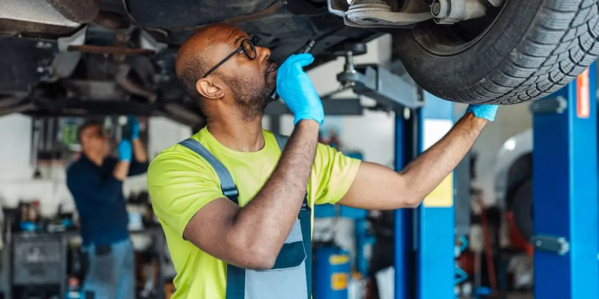 mechanic inspecting car in Perth